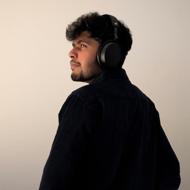 Manusha Fernando wearing headphones